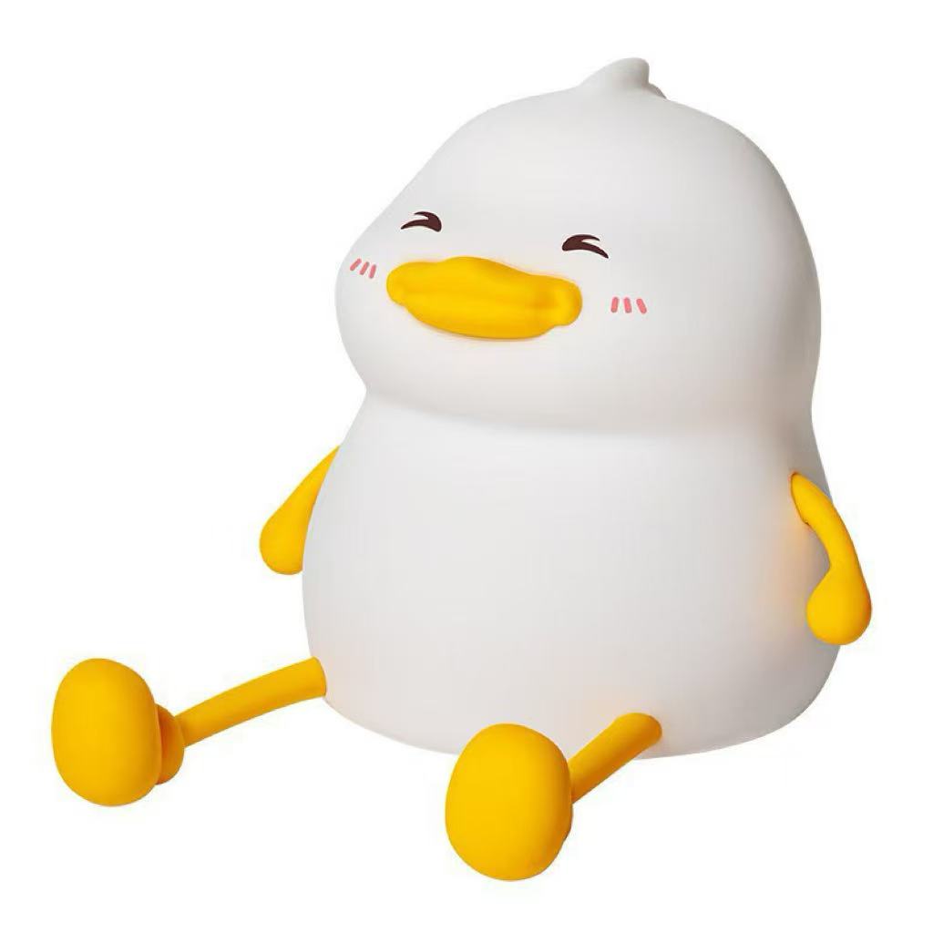 Cross-border e-commerce hot-selling little duck ambient night light, bedroom bedside soft light silicone lamp, cute chubby duck patting lamp.