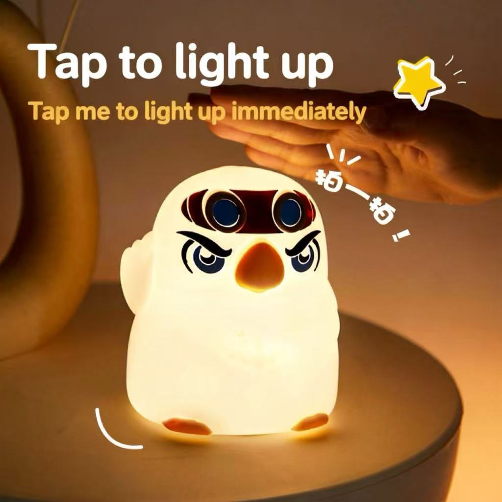 Penguin night light with touch control glowing warmly