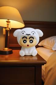 Shin-chan night light on bedside table in bedroom