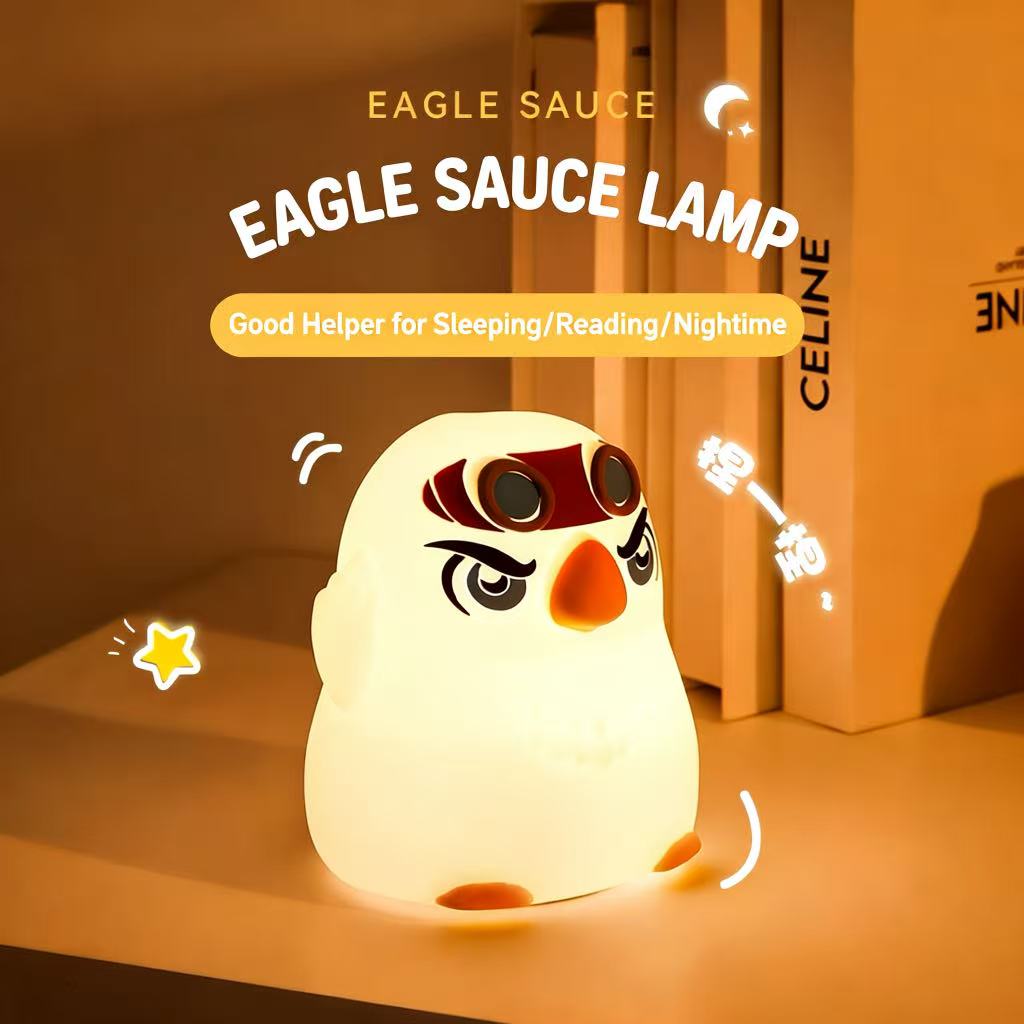 Cute Penguin Silicone Night Light glowing on bedside table