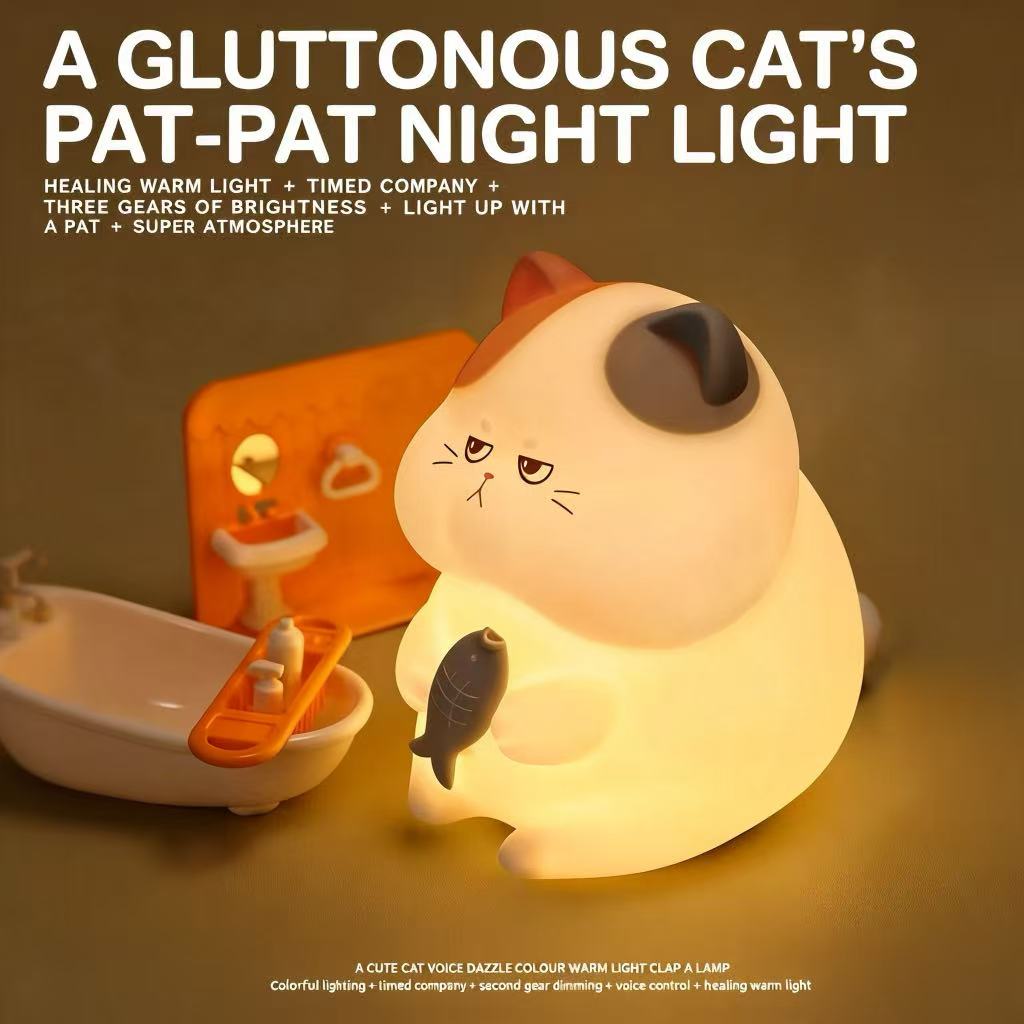 Greedy Cat Pat-Pat Night Light glowing warmly